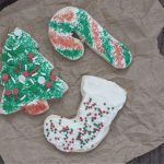 Easy Christmas sugar cookies decorated for the holidays on a table