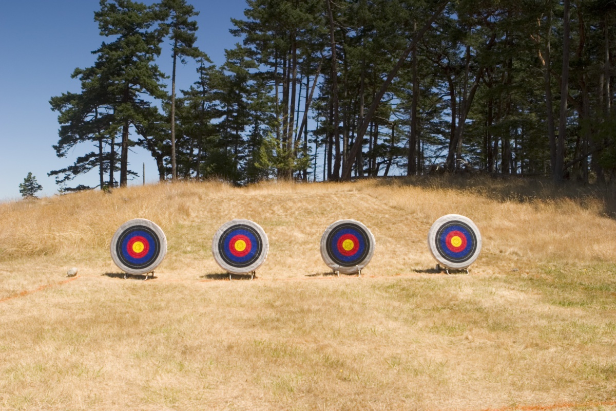 Kids learning about archery