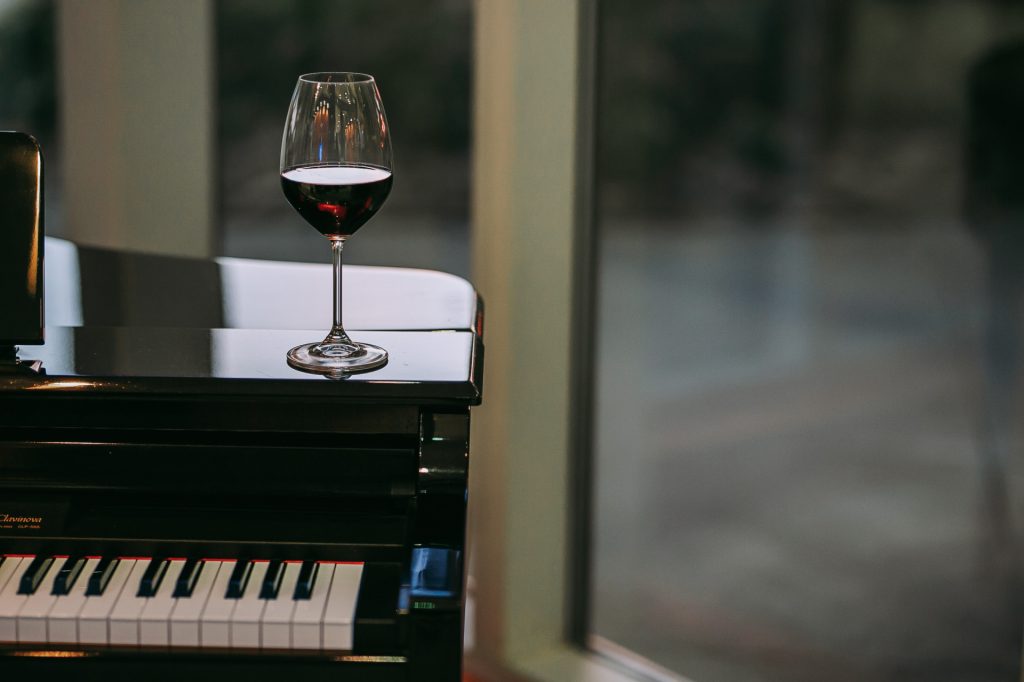 Inexpensive Red Wines wine on piano