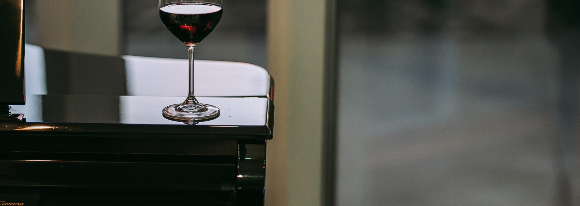 Inexpensive Red Wines wine on piano