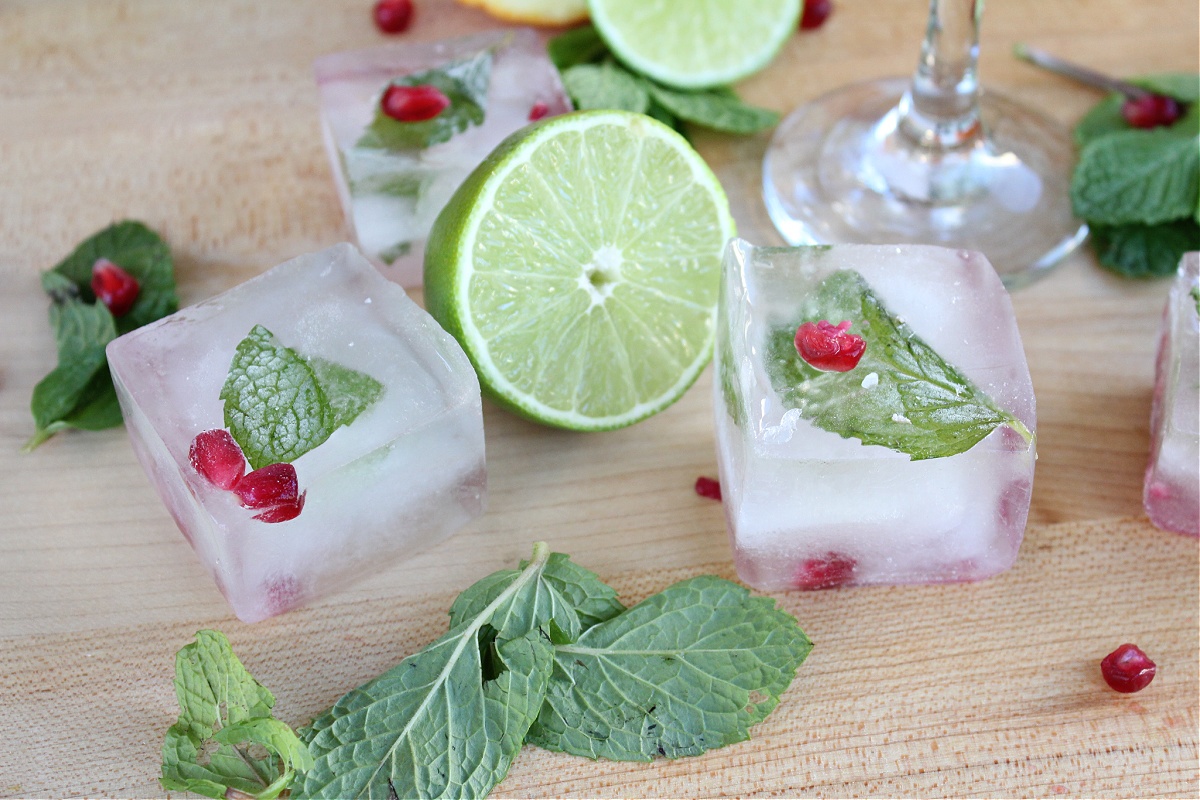 Tequila with Mint Pom Infused Ice Cubes