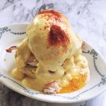 eggs benedict with crab and bacon