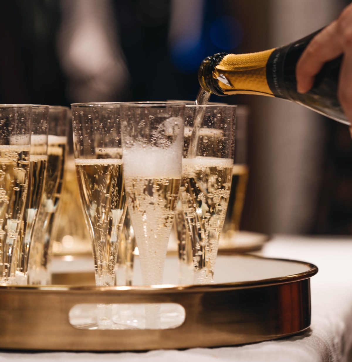 Why does champagne have bubbles