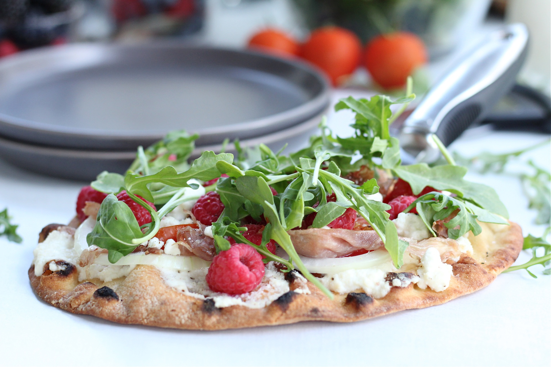 Raspberry and Prosciutto Pizza with Arugula and Goat Cheese