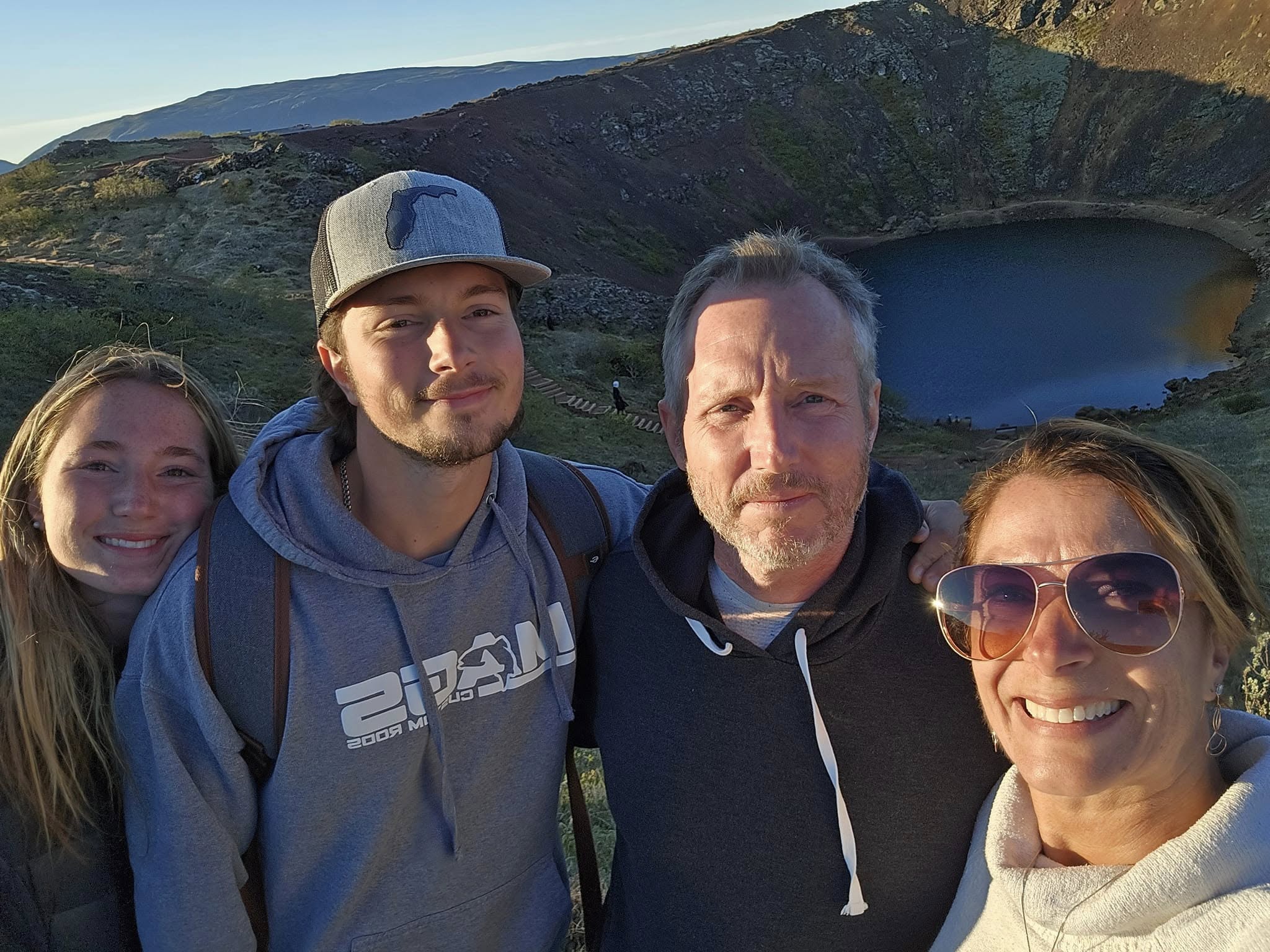 Kerið volcanic crater lake in Iceland with bright red walls and turquoise water. Kerið volcanic crater lake in Iceland with bright red walls and turquoise water.