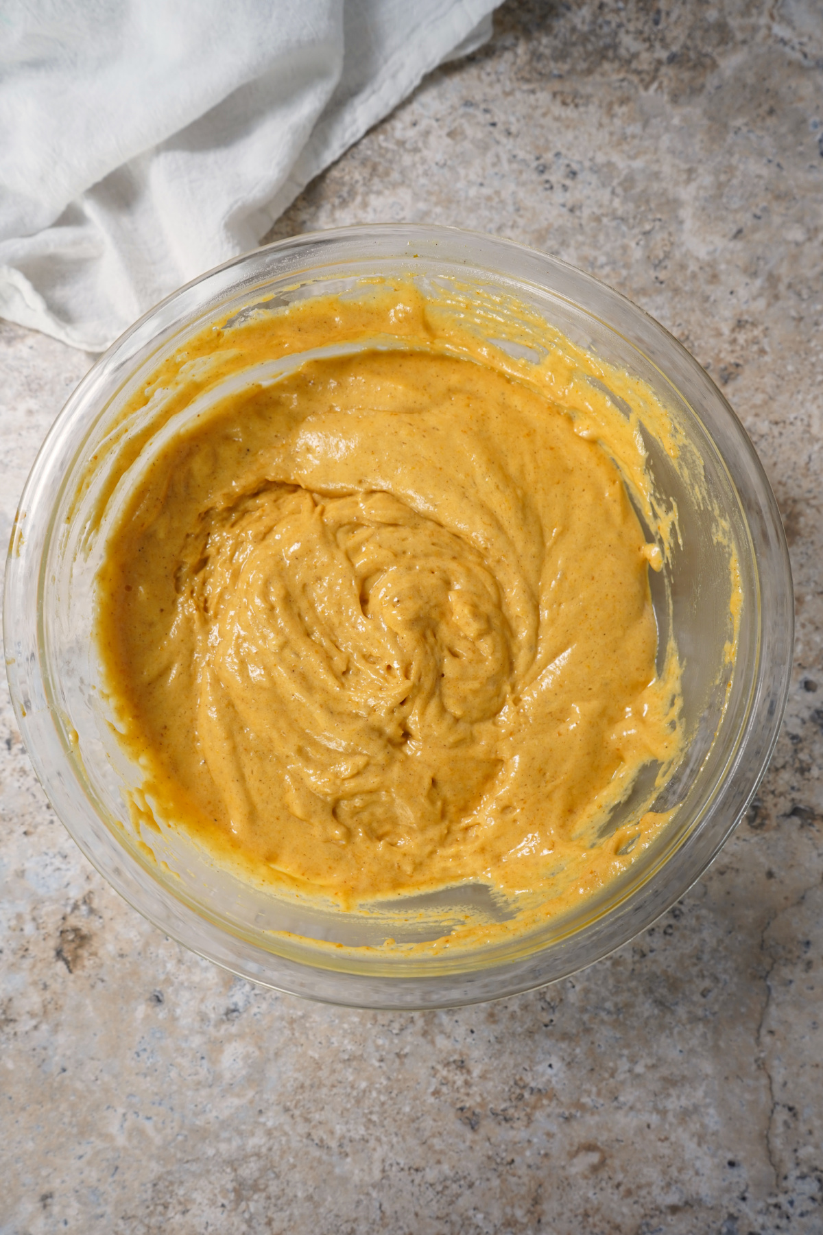 Pumpkin Angel Food Cake batter in a medium bowl, easy healthy fall dessert, Weight Watchers friendly recipe