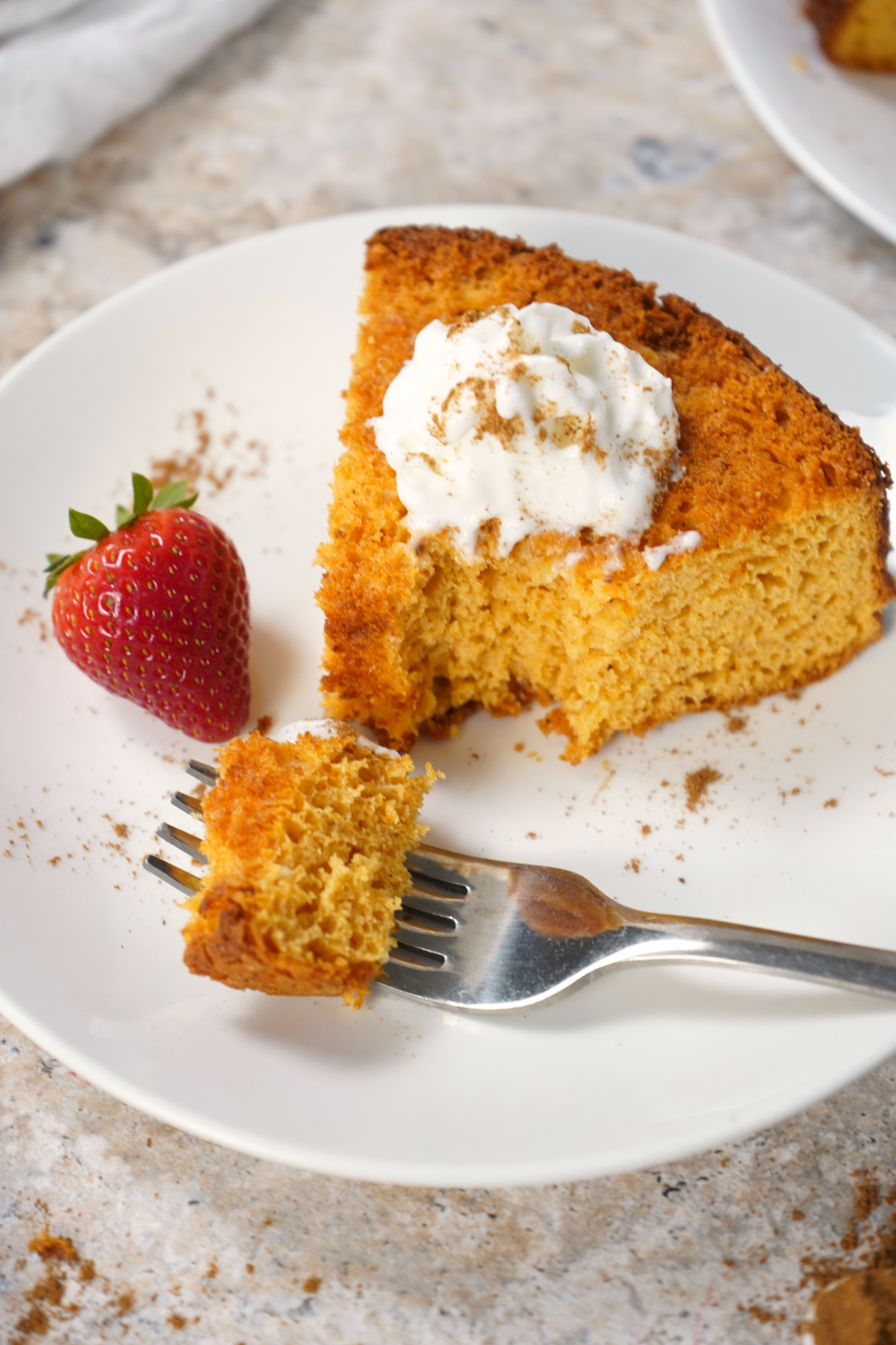 Pumpkin Angel Food Cake topped with pumpkin spice and whipped cream, Weight Watchers dessert idea