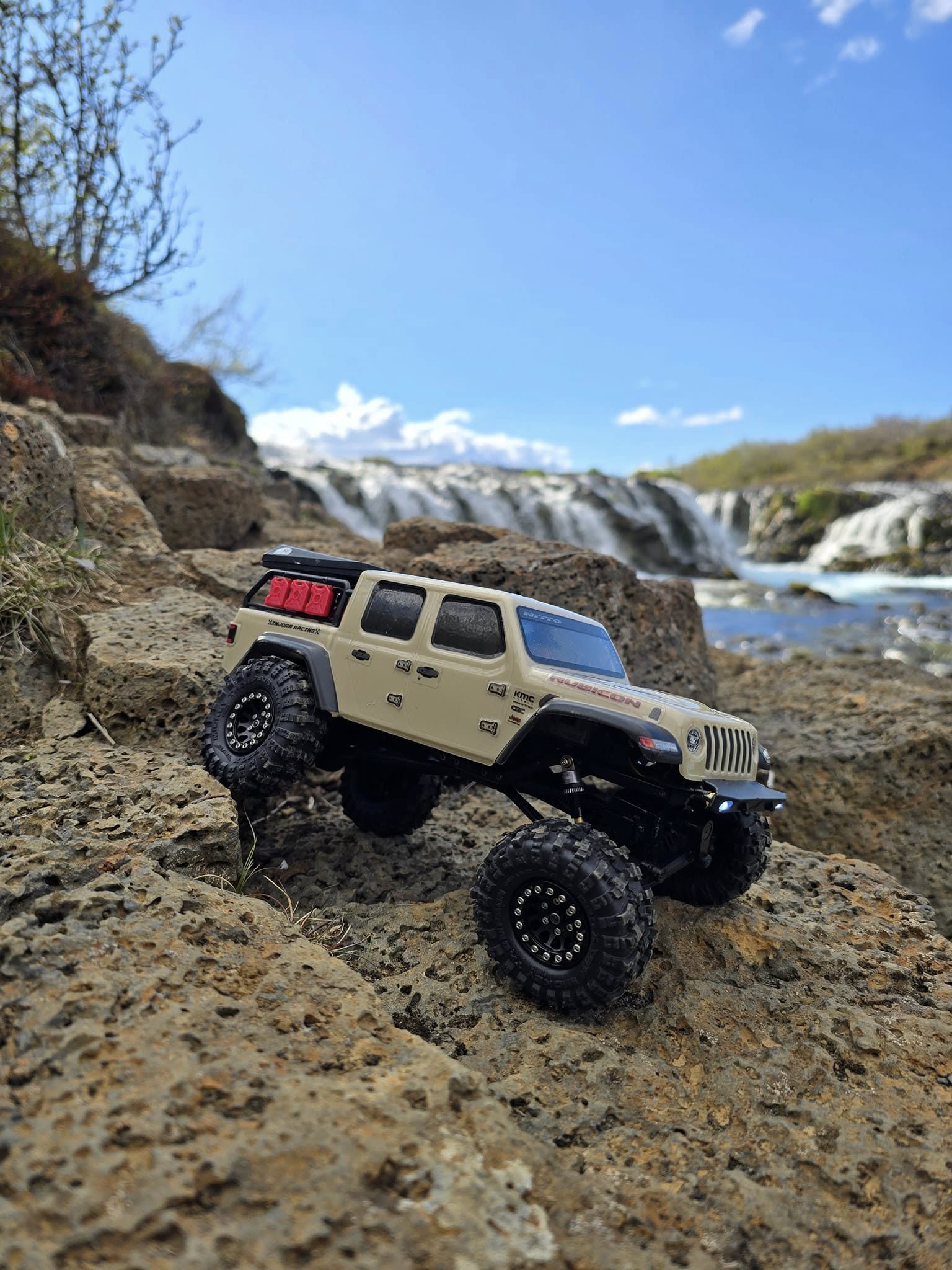 Remote control Jeep driven by a 19-year-old near a waterfall in Iceland’s countryside. Remote control Jeep driven by a 19-year-old near a waterfall in Iceland’s countryside.