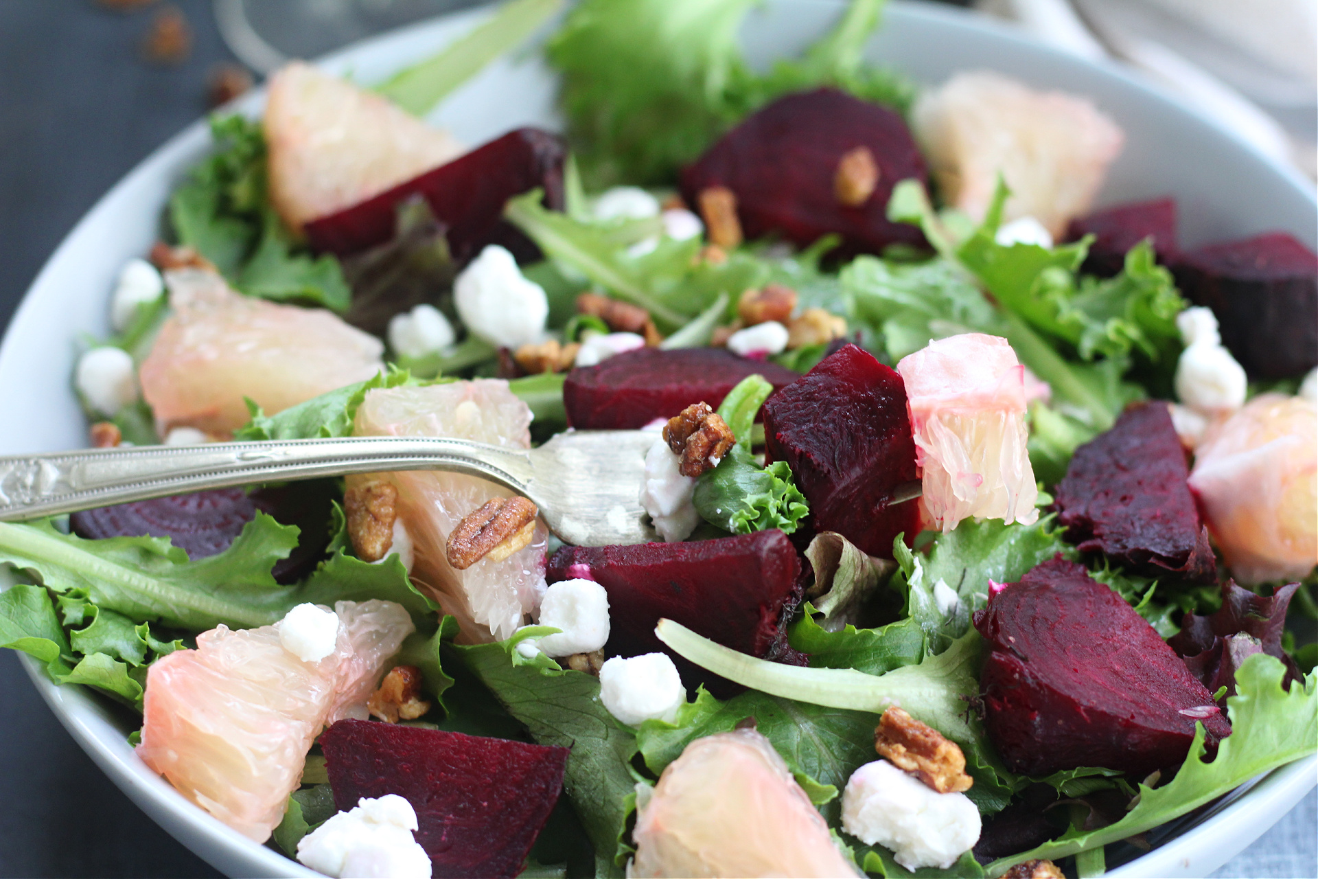 Seasonal beet and pummelo salad with fresh greens