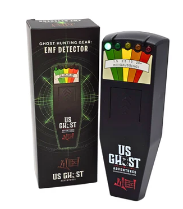 Ghost hunting tools including EMF reader, flashlight, dowsing rods, and spirit box radio.