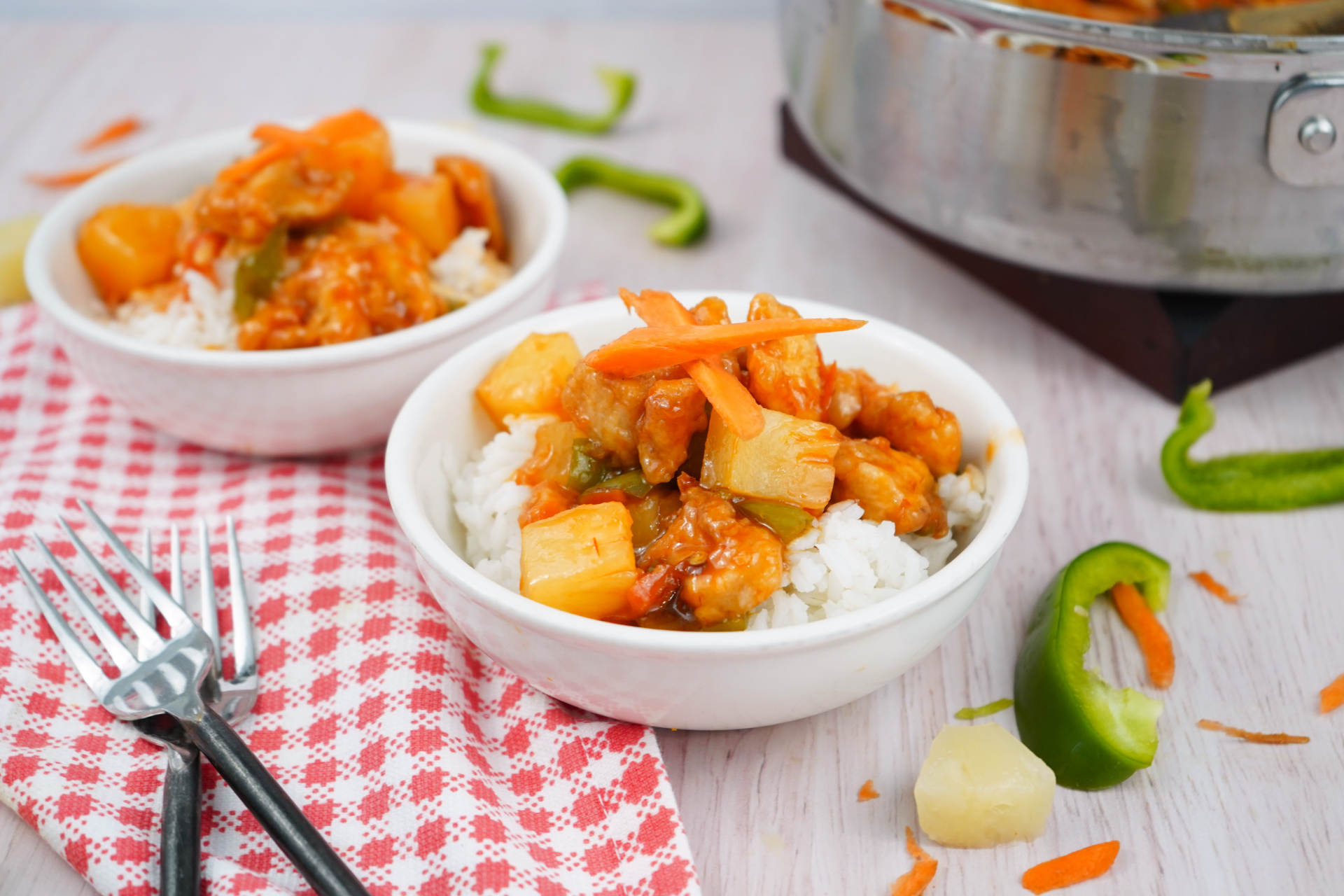 Easy sweet and sour chicken recipe with golden chicken, peppers, and pineapple on rice. Easy sweet and sour chicken recipe with golden chicken, peppers, and pineapple on rice.