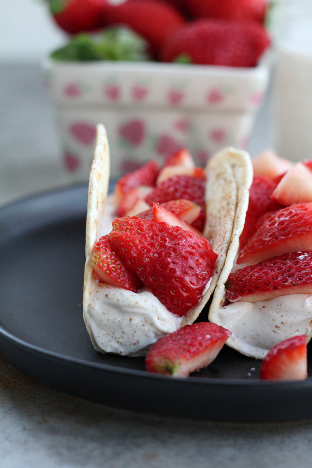 Strawberry breakfast tacos served as a sweet brunch option
