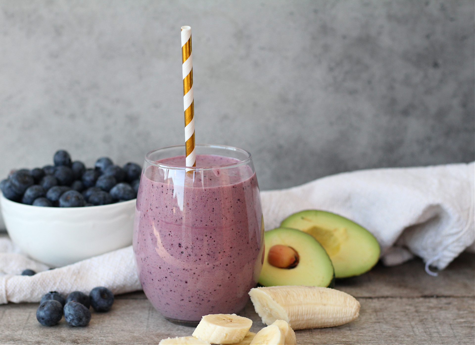 Creamy blueberry avocado smoothie made with banana and milk