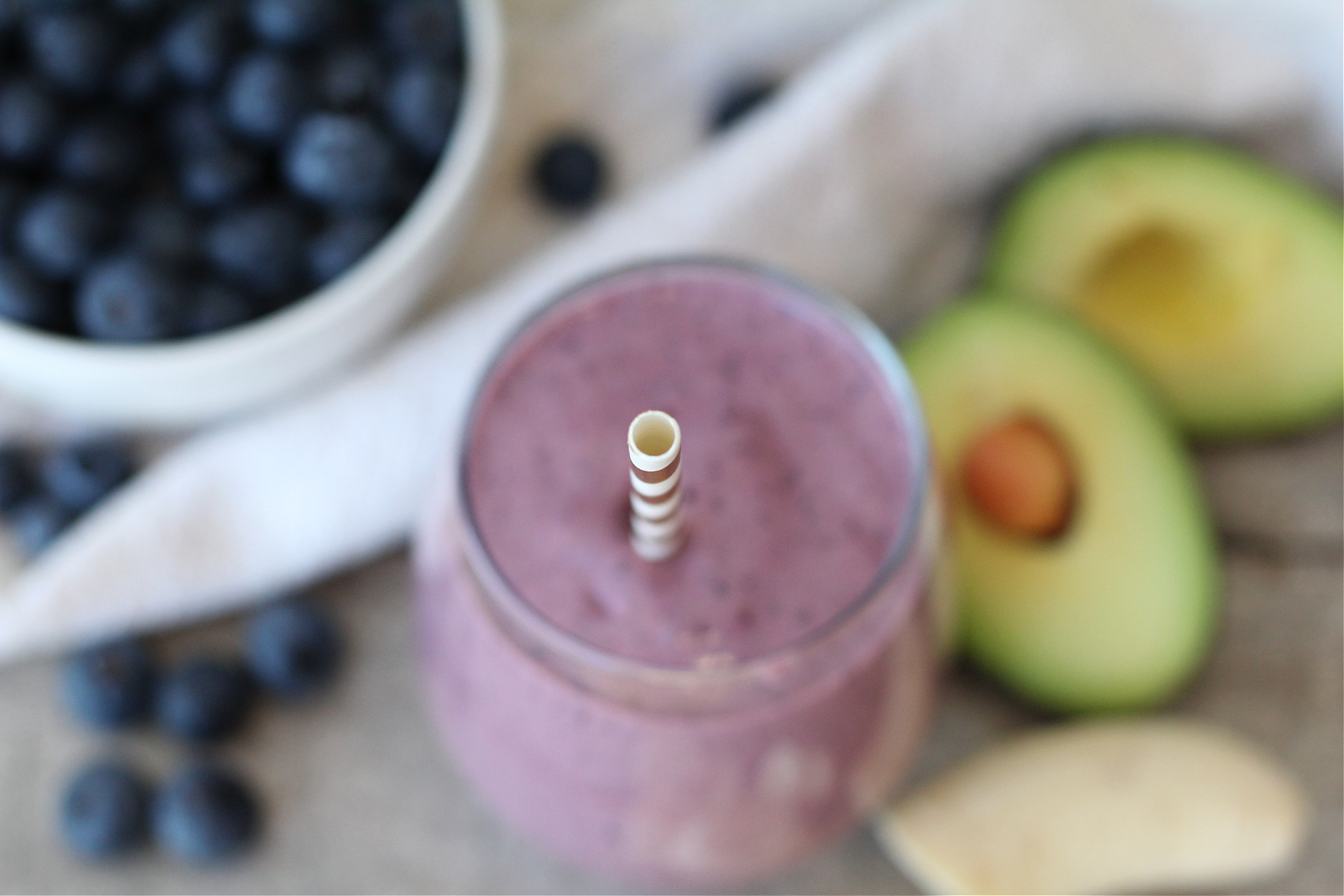 Blueberry avocado smoothie with fresh blueberries, banana, and avocado