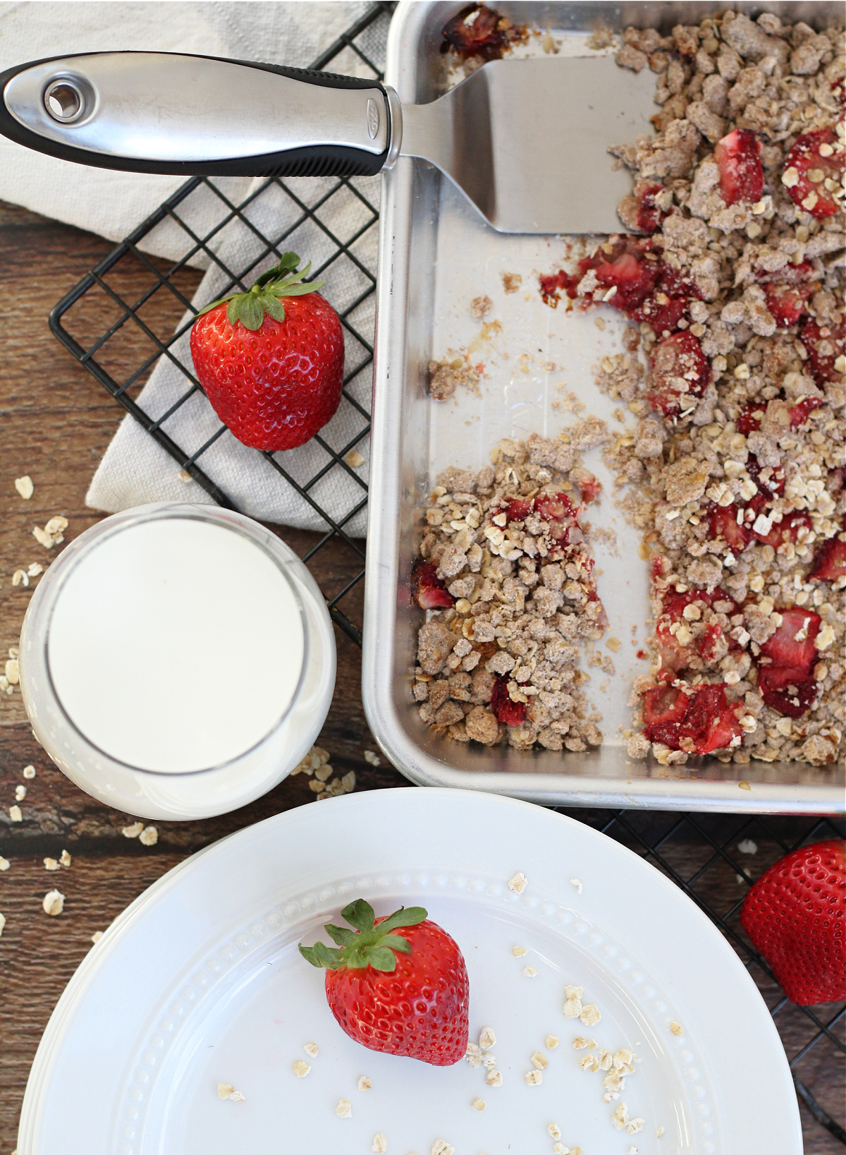 Freshly baked strawberry oatmeal breakfast bars on a cooling rack