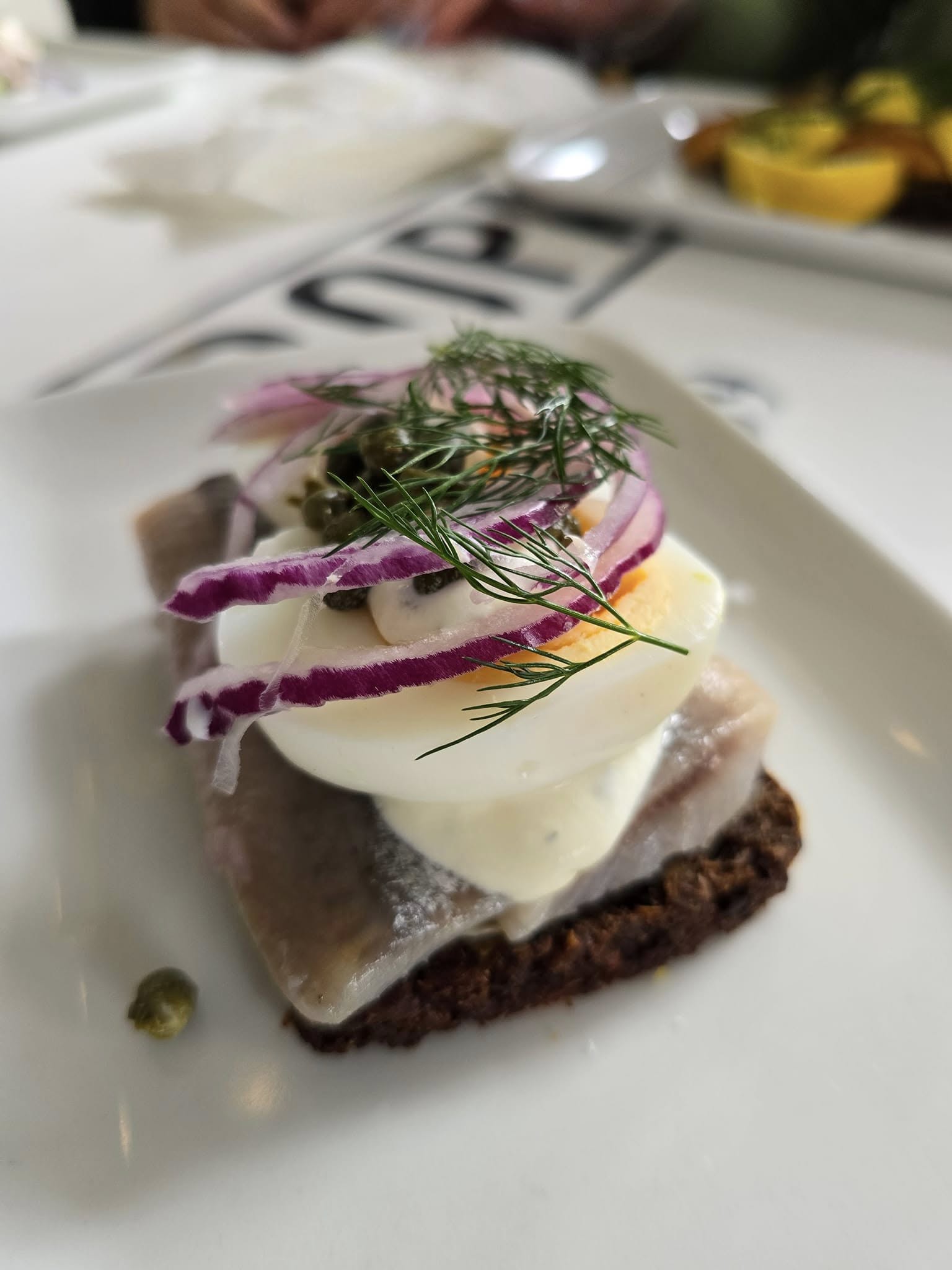 Traditional Danish sm&oslash;rrebr&oslash;d served at Amalie restaurant in Copenhagen
