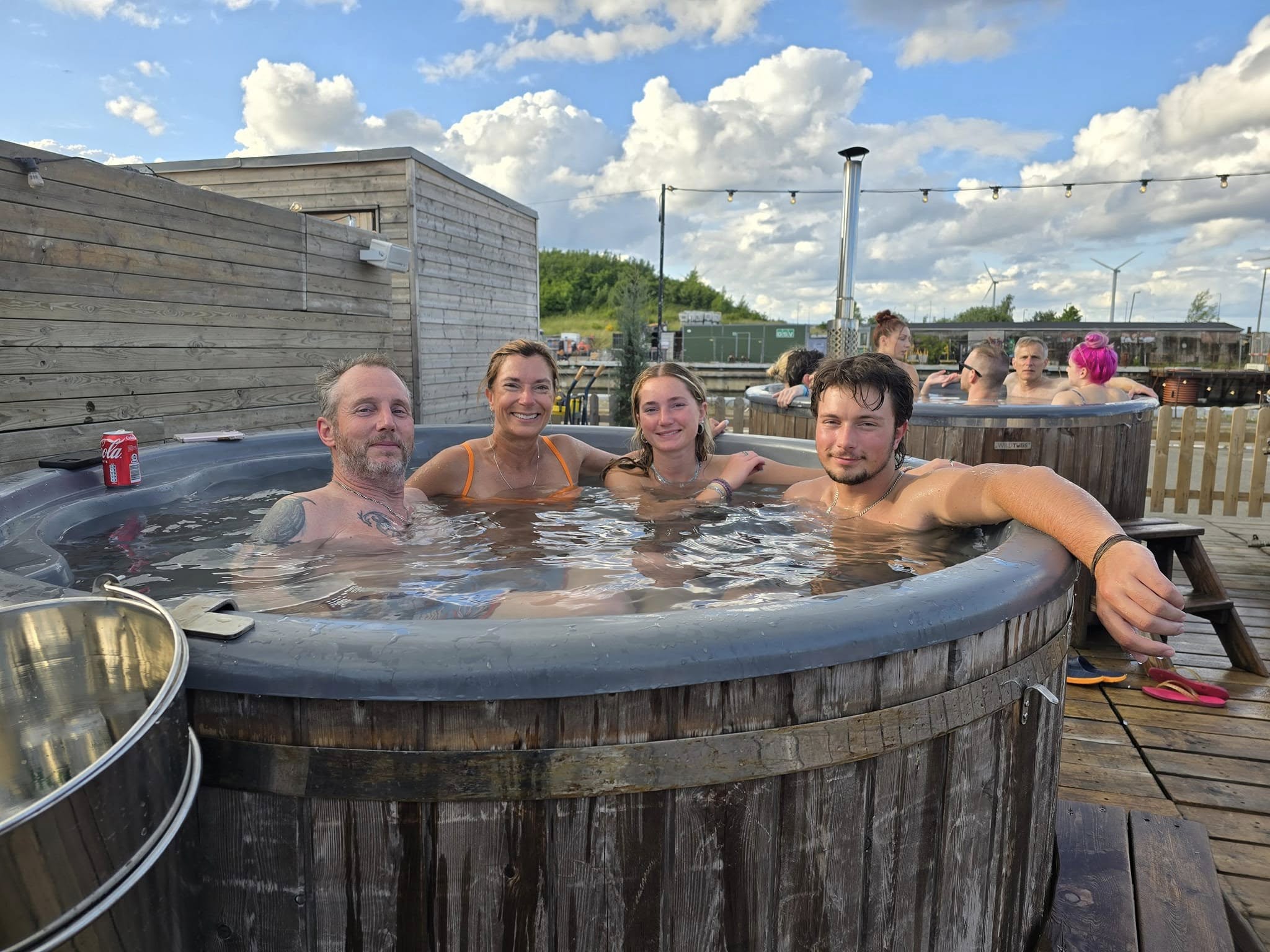Relaxing in a harbor-side hot tub during a hot and cold plunge in Copenhagen