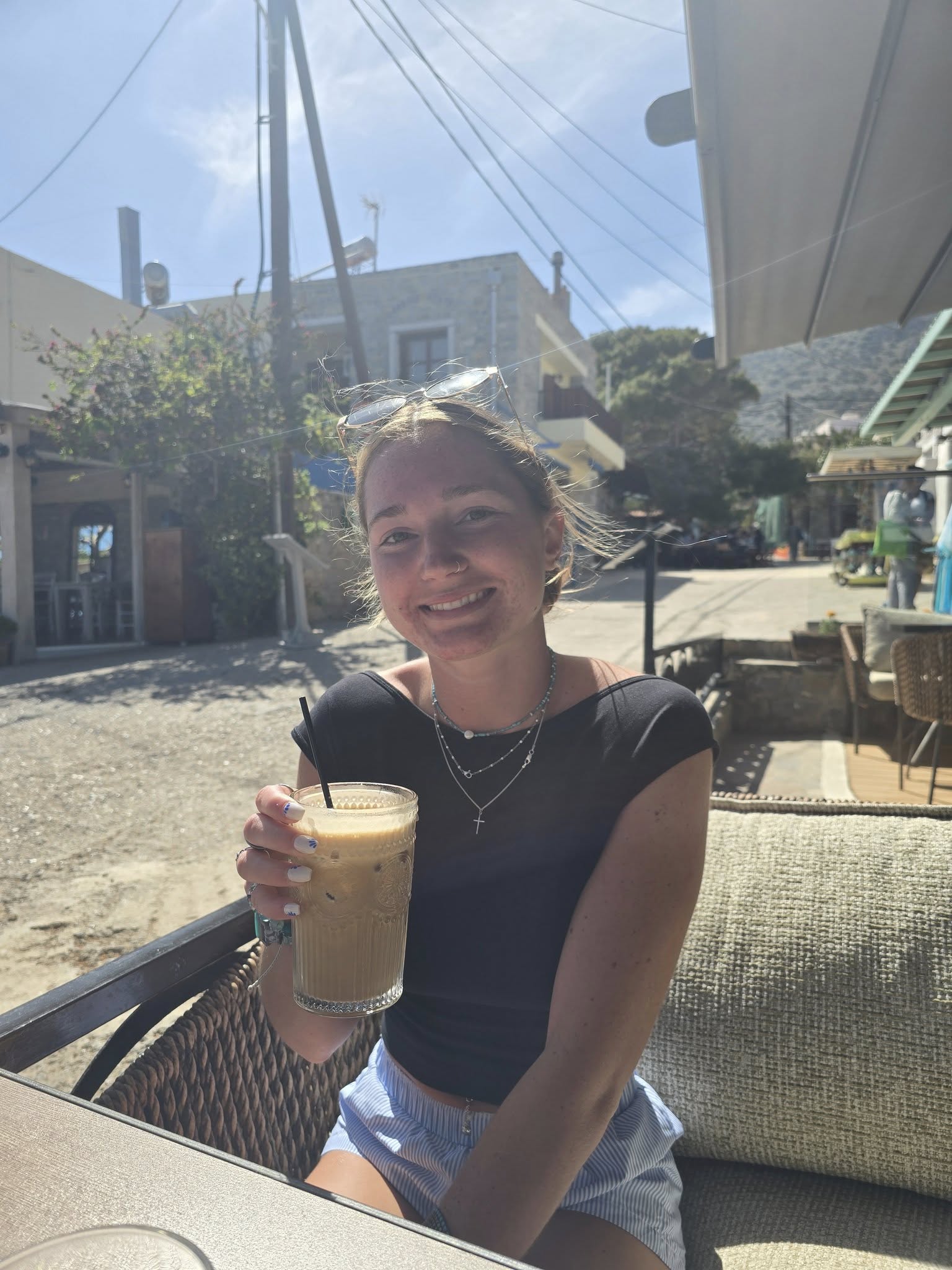 Having an iced coffee in Elounda Crete Greece