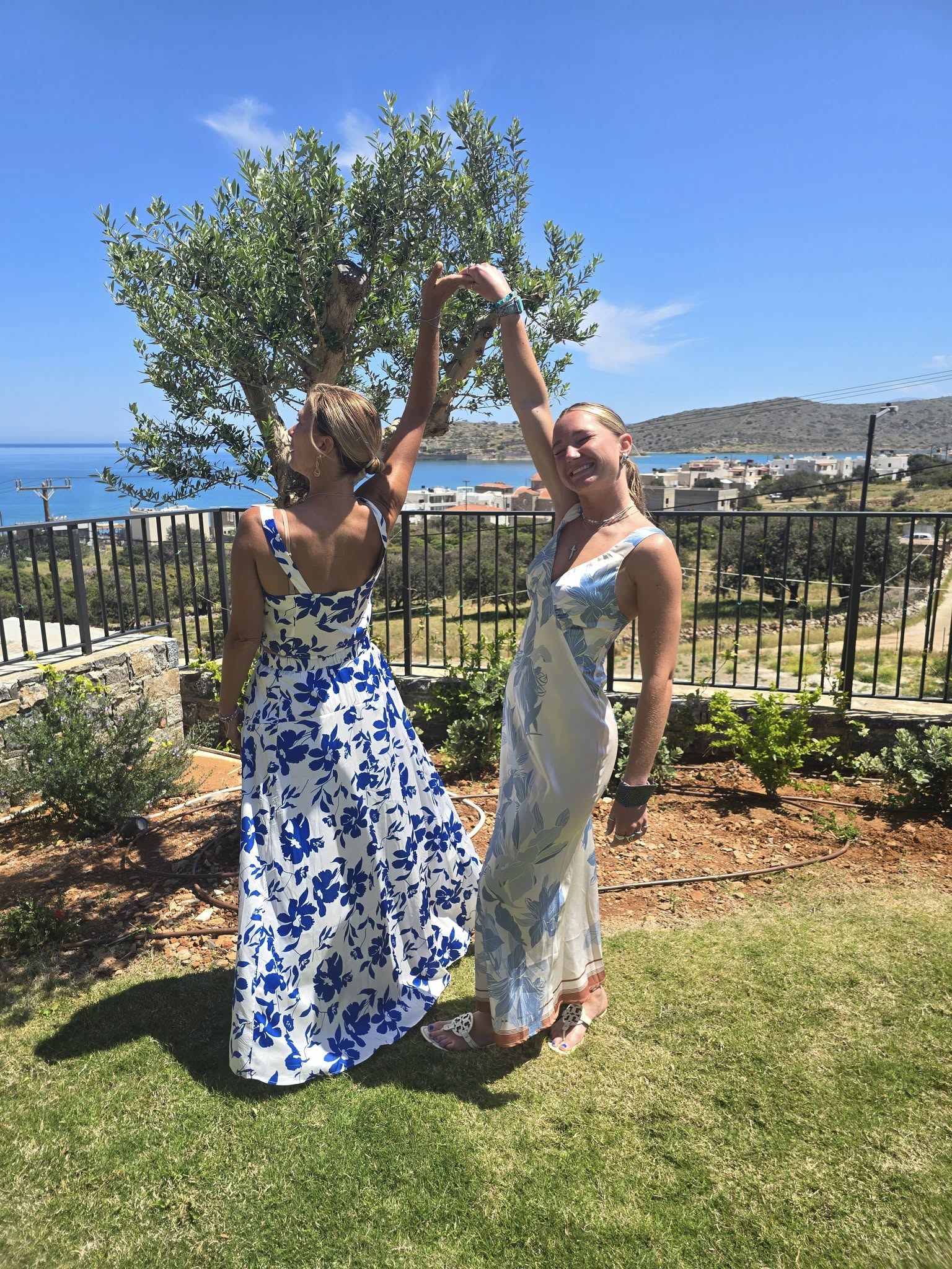 Mom and daughter dancing at Easter Celebration at Cayo Resort in Crete Greece