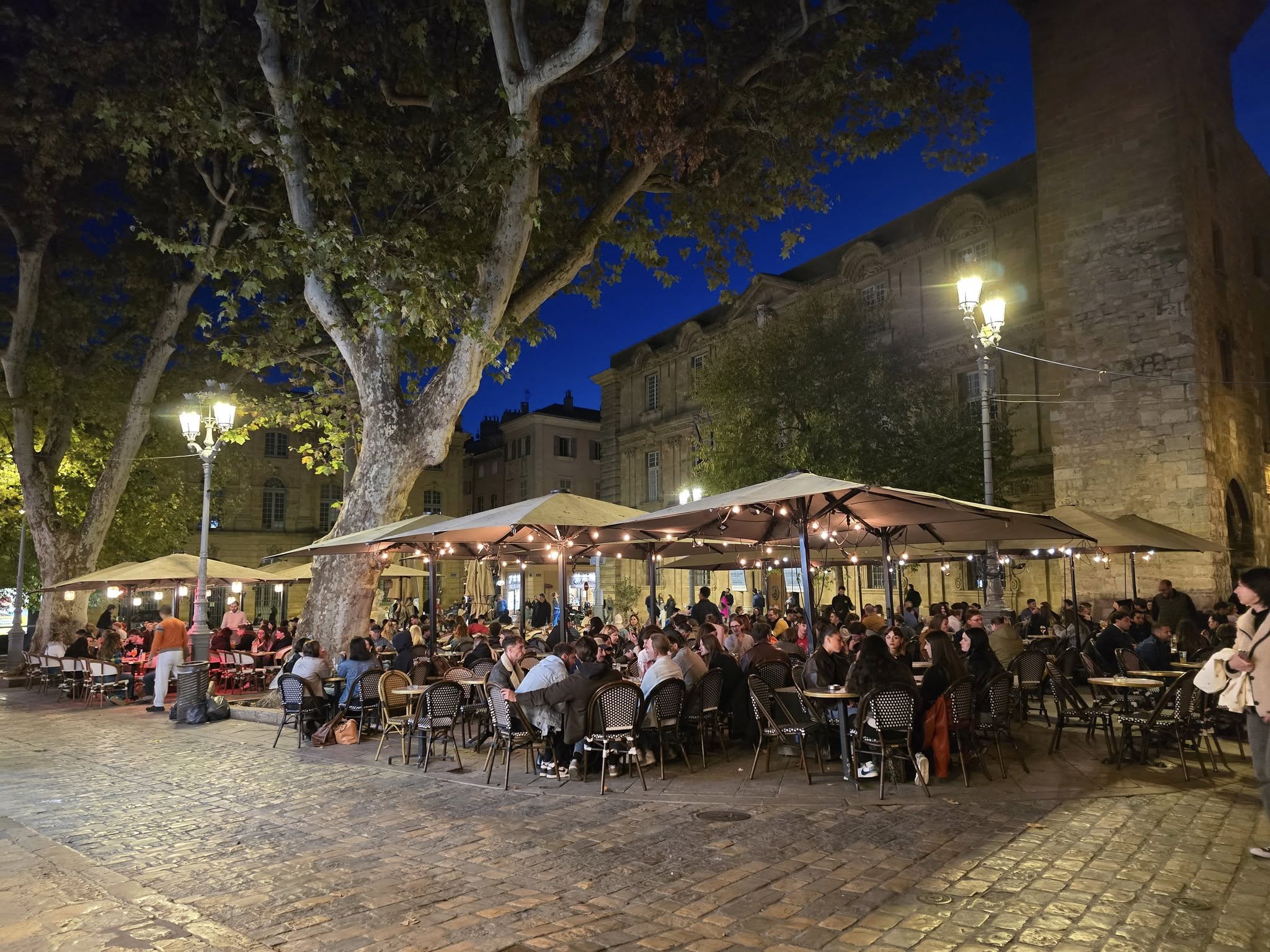 Cours Mirabeau Aix-en-Provence outdoor caf&eacute;s and shaded boulevard