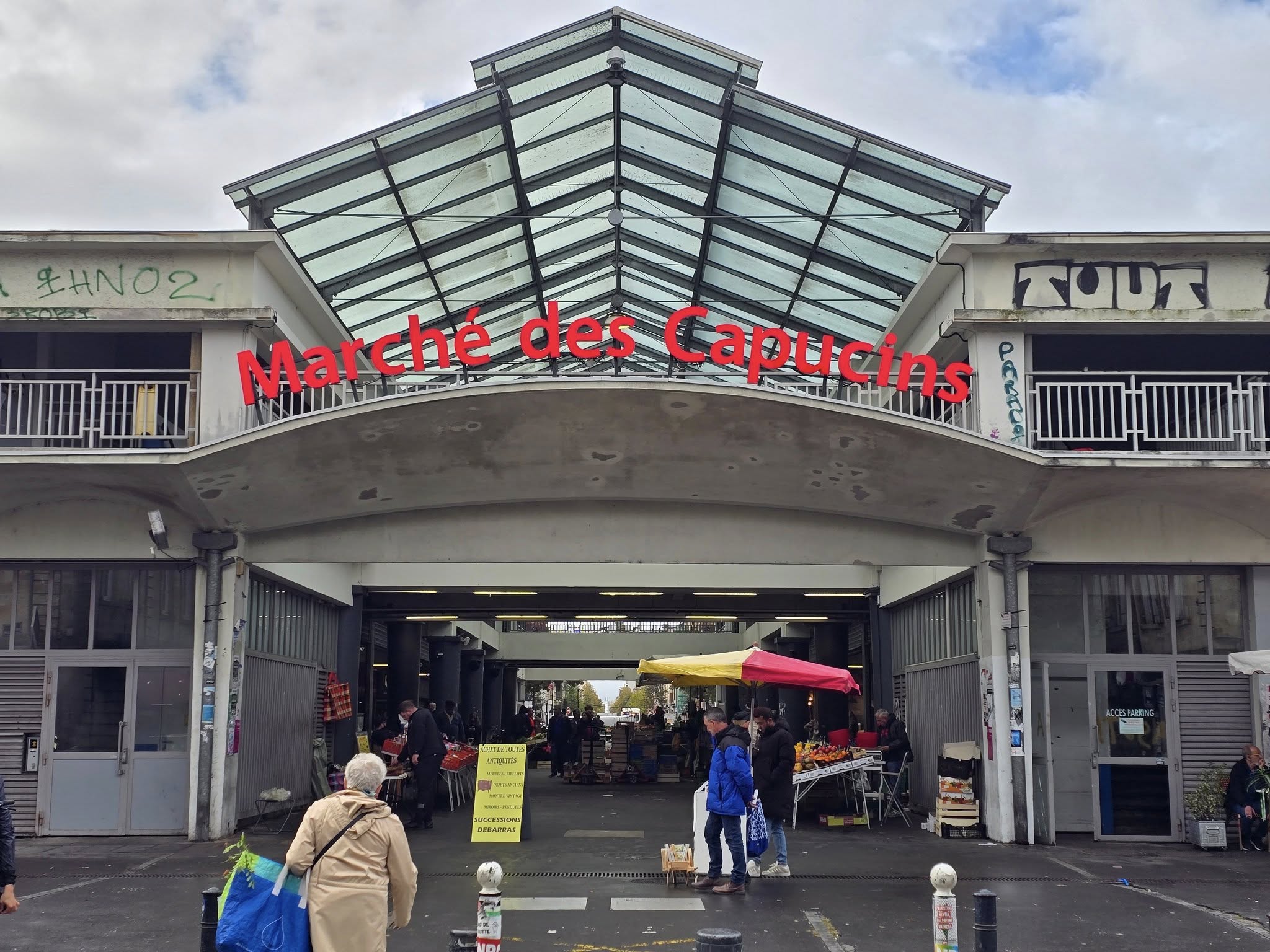 March&eacute; des Capucins Bordeaux local market with fresh produce and cheese