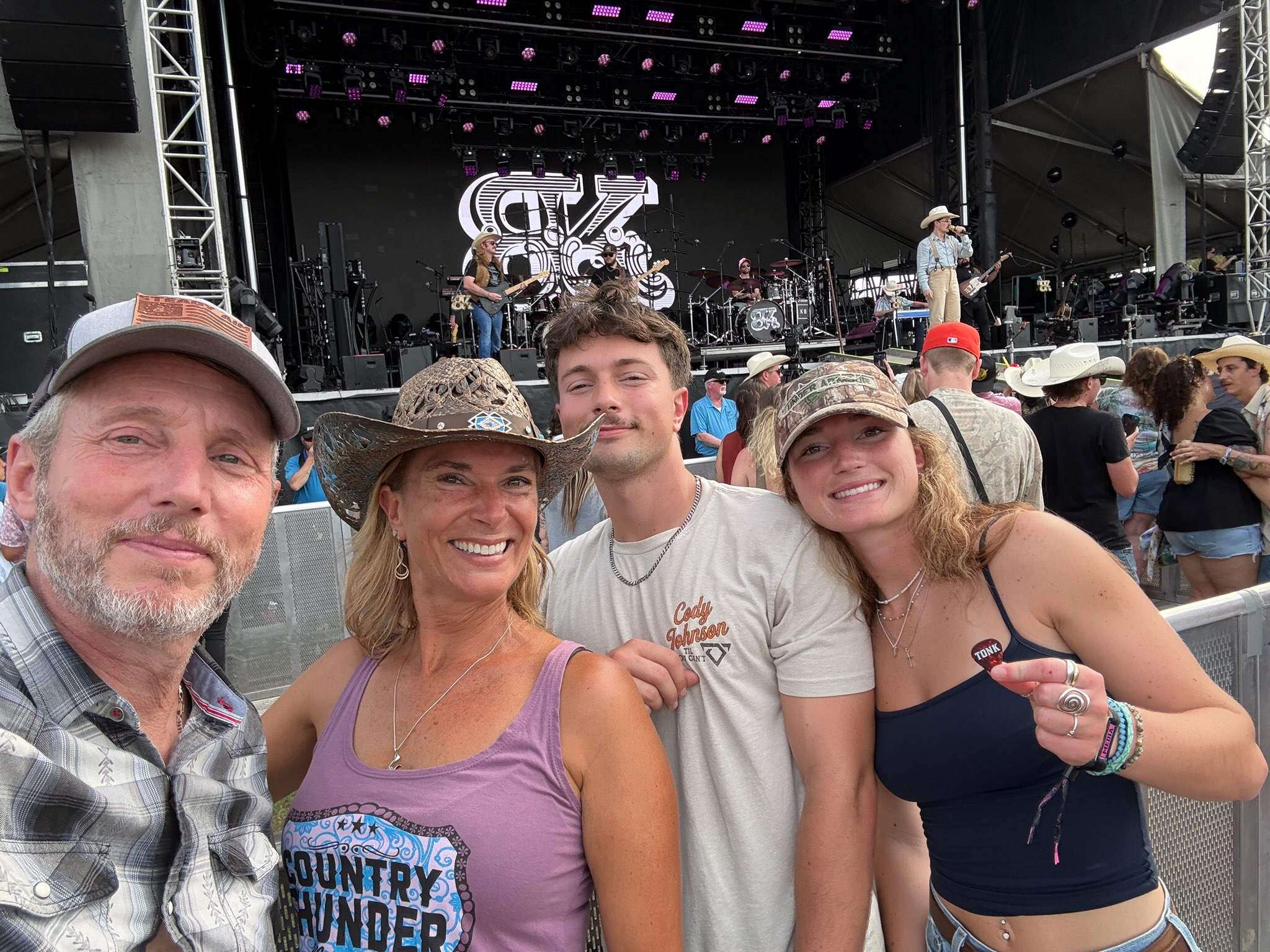 family at country thunder florida with Braxton Kieth singing on stage
