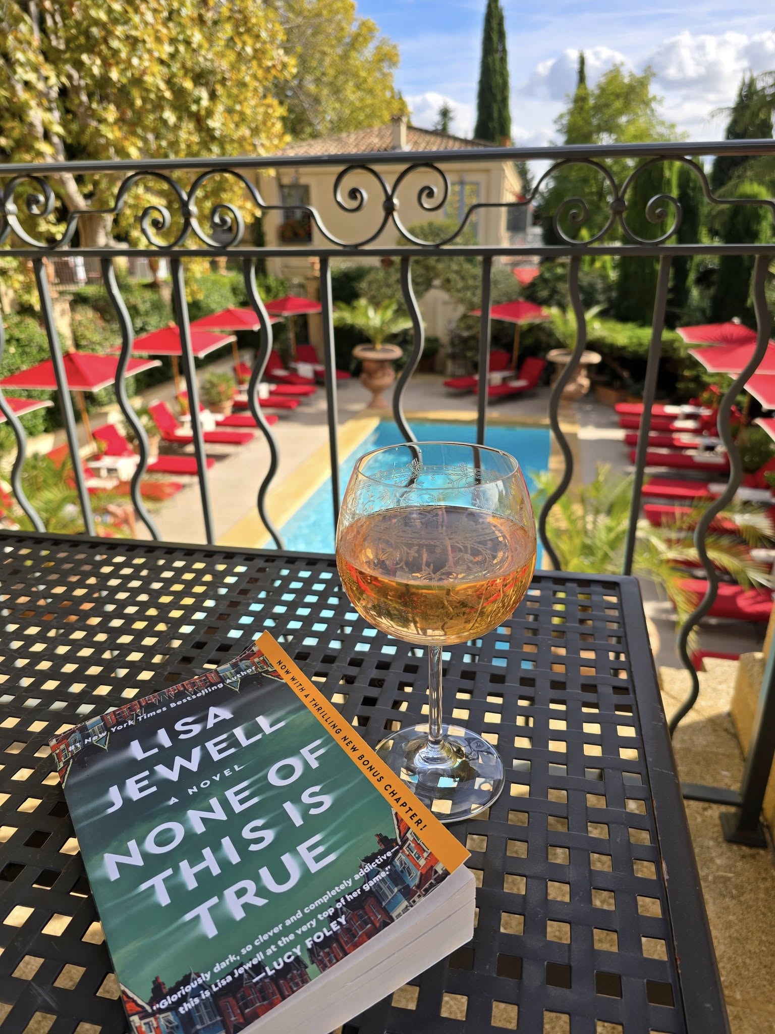 pool terrace at Villa Gallici with wine and garden views