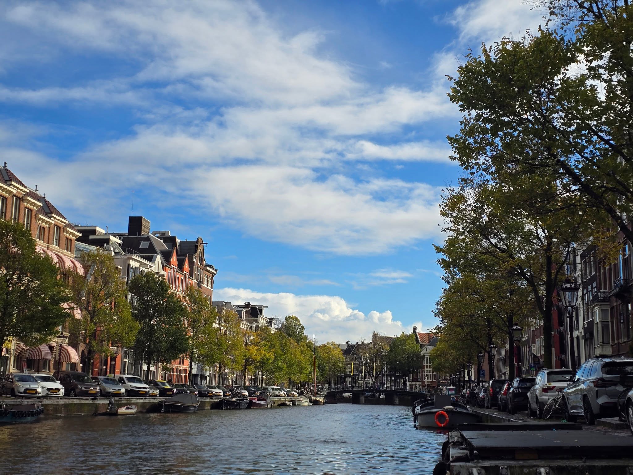 Amsterdam travel guide featuring local food and historic canals