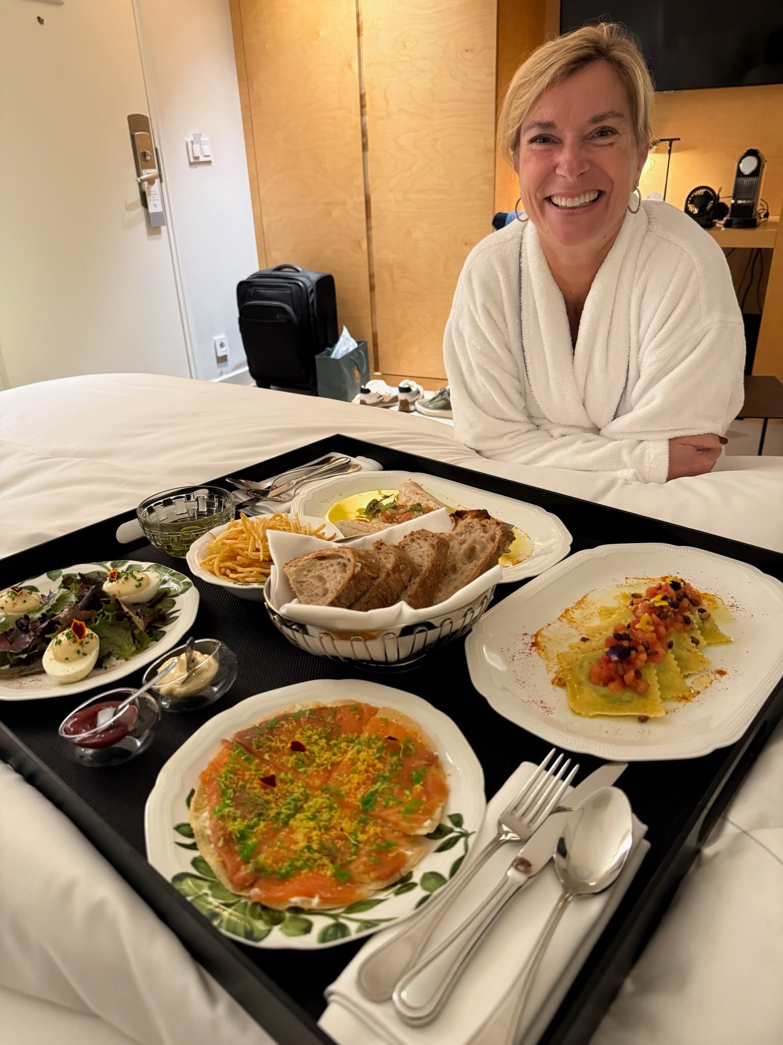 Enjoying Room service at a hotel in Paris