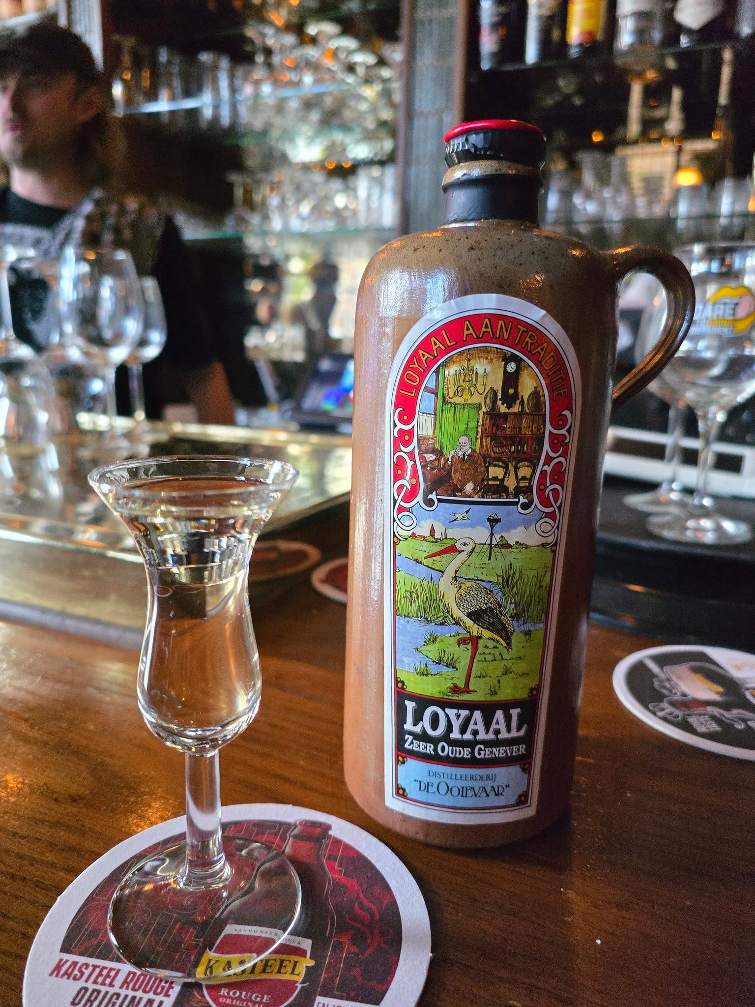 Traditional Dutch genever served at a bar in Amsterdam
