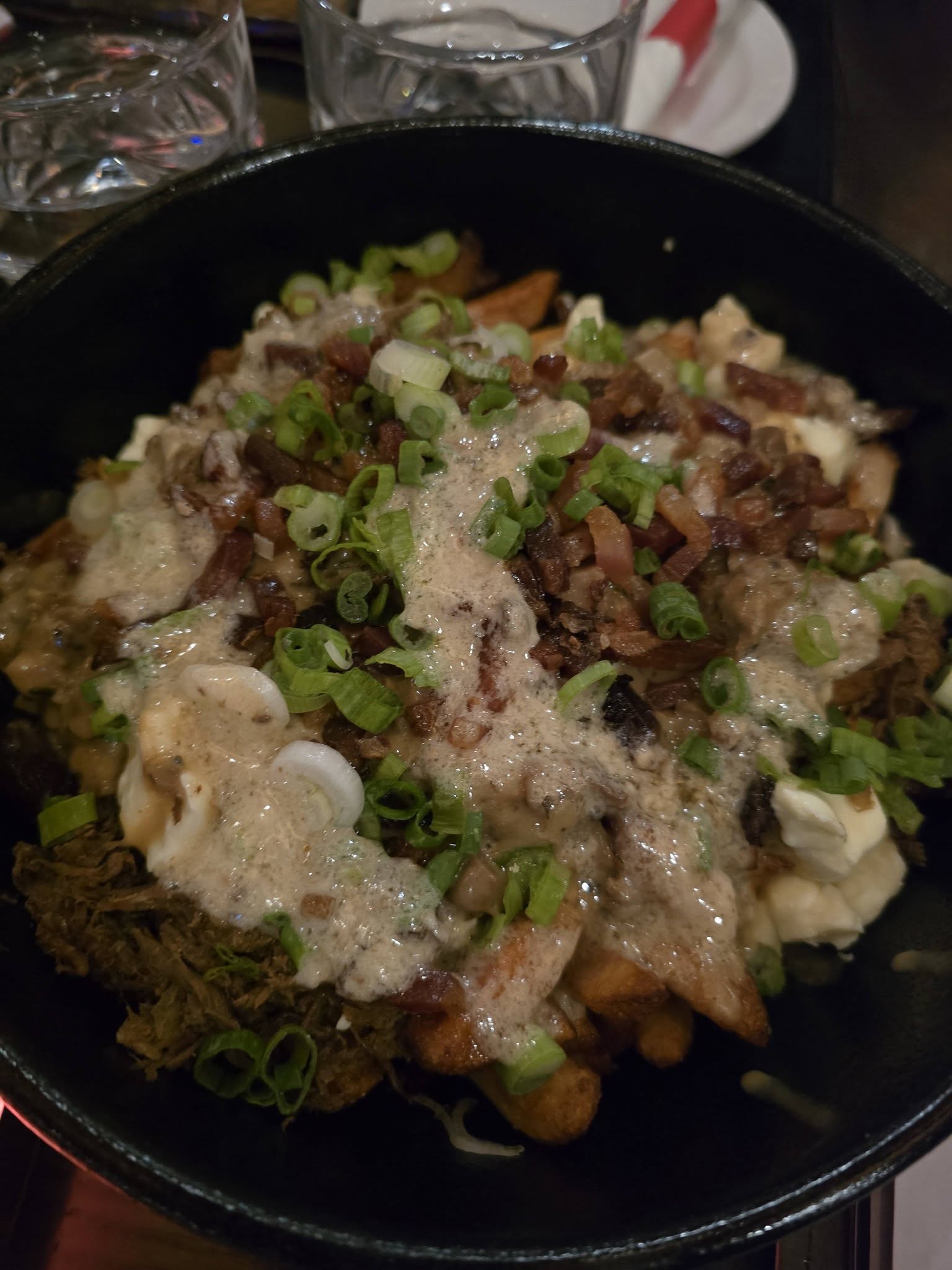 Canadian poutine with French fries cheese curds and gravy