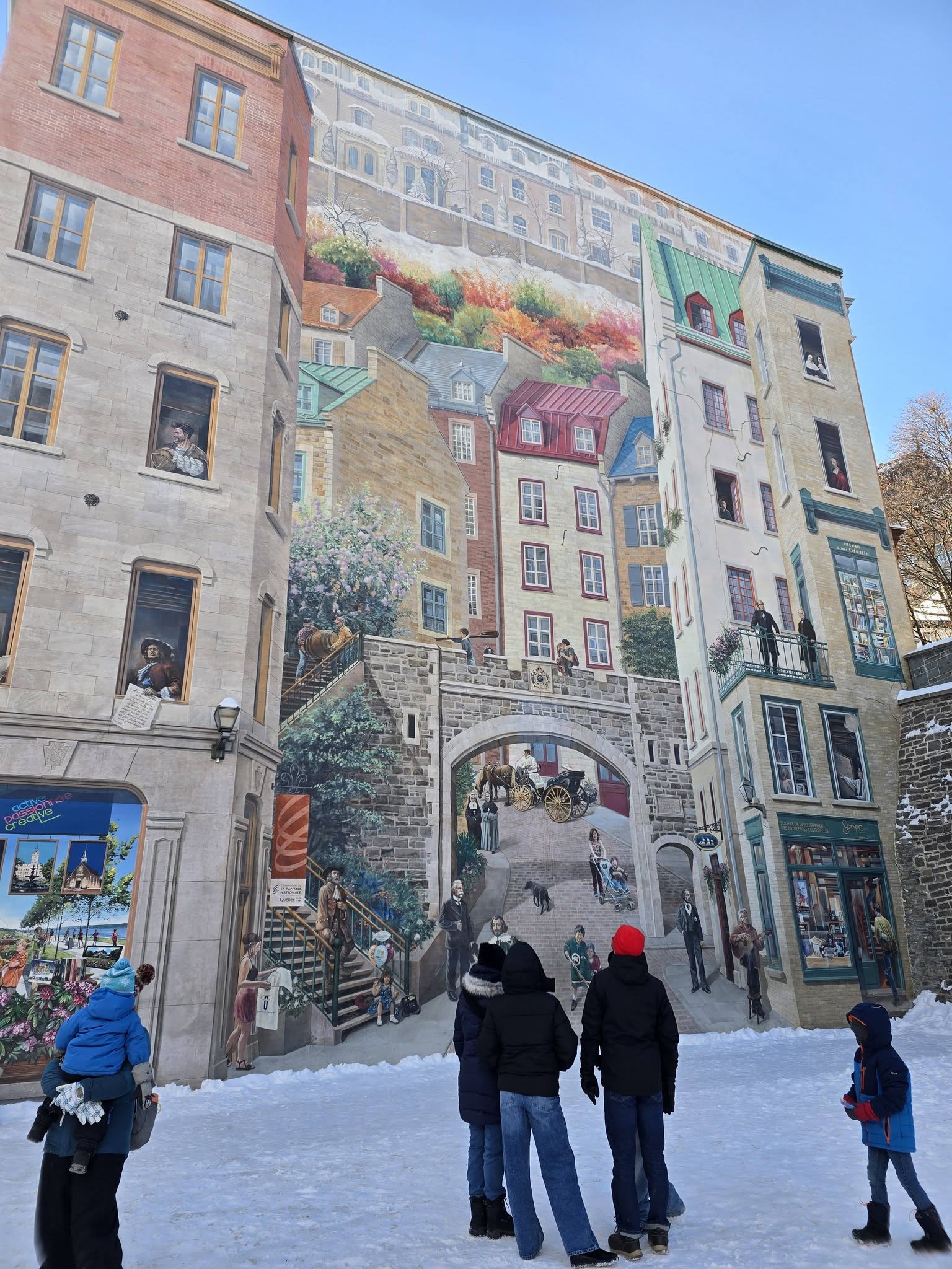 Families on walking tour in Quebec City in winter