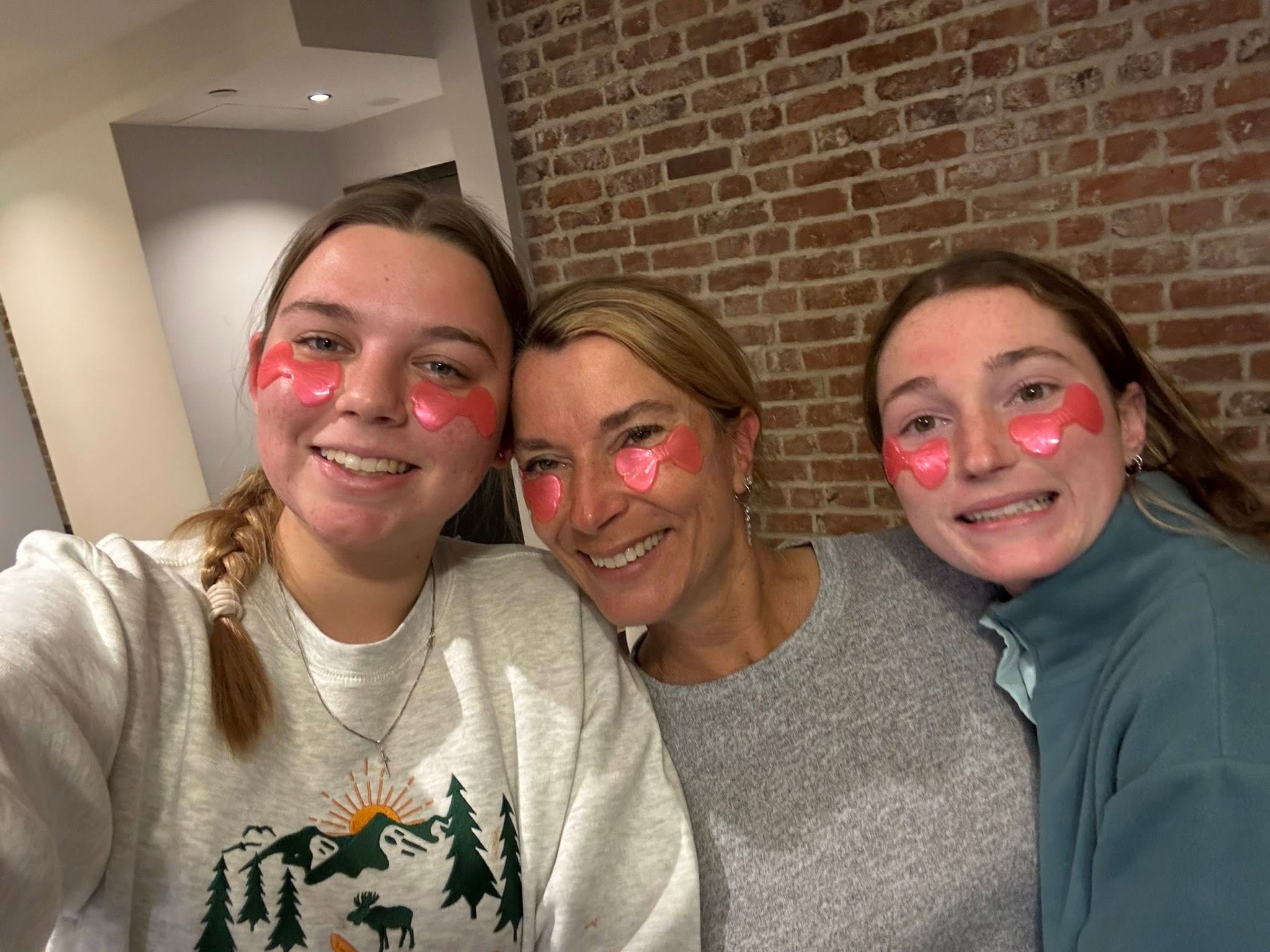 Family enjoying eye masks before flight