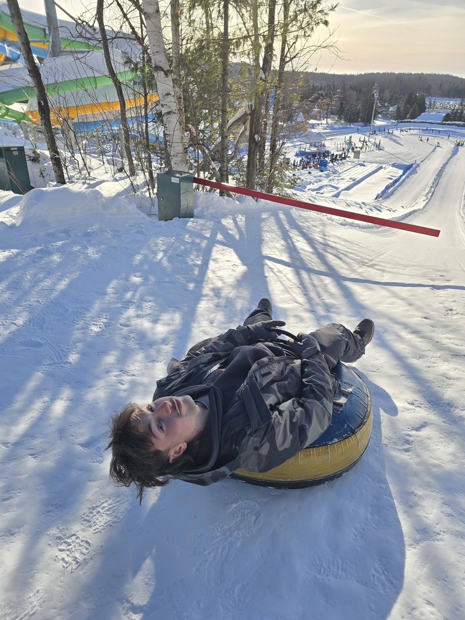 Family enjoying winter activities during a Christmas vacation in Canada