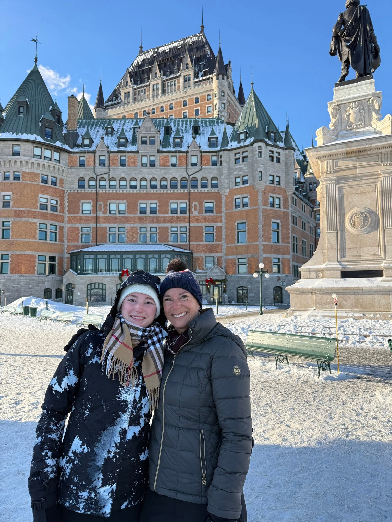 Mom and daughter in front of Fairmont Le Château Frontenac in Quebec City